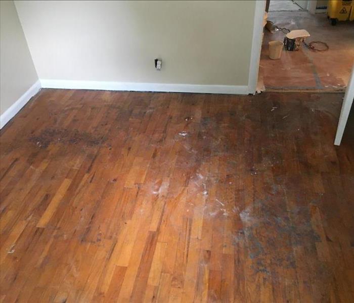 Soot covered hardwood floor
