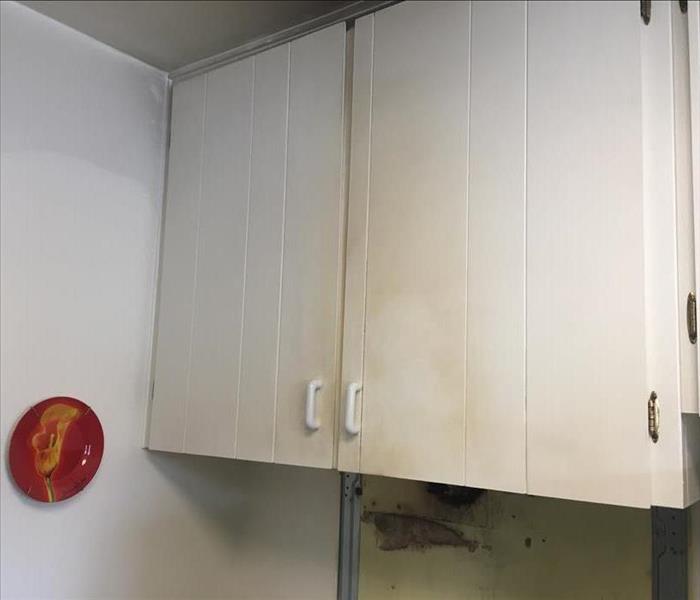 Kitchen cabinets after fire damage restoration