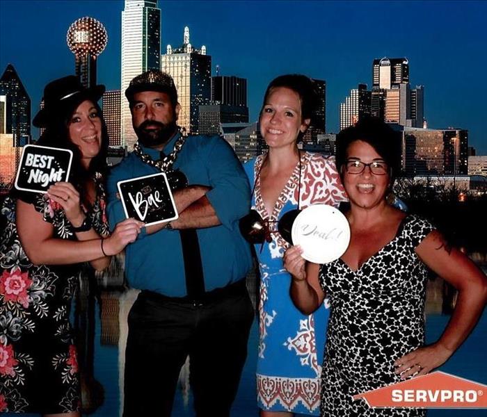 SERVPRO employees dressed up for photo booth at 2021 SERVPRO Convention