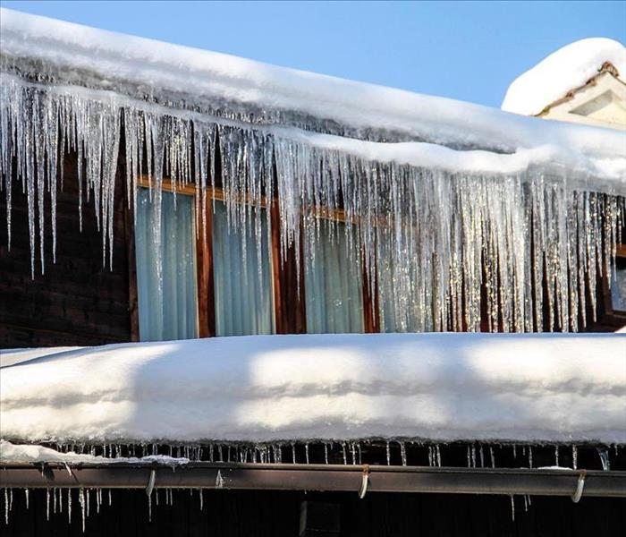 Icicles having from eaves on house